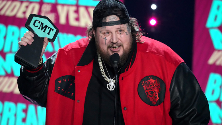 Jelly Roll accepting his CMT award