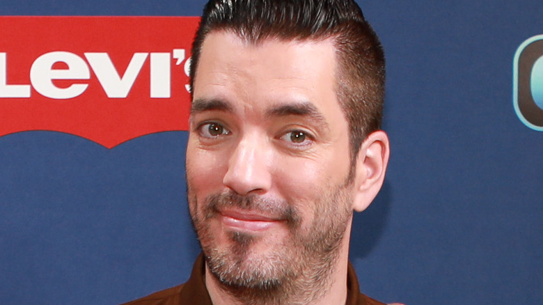 One of the Property Brothers poses in 2019