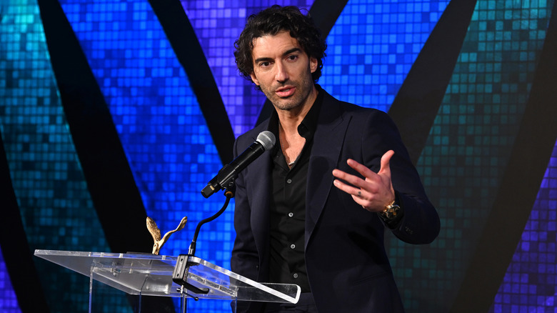 Justin Baldoni speaking at an event