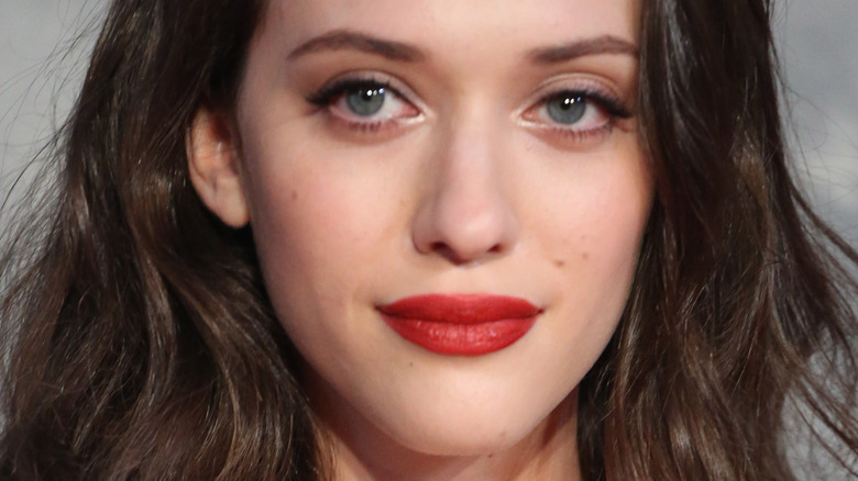 Kat Dennings poses