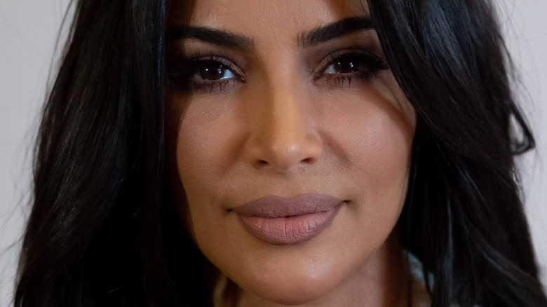 Kim Kardashian smiles at an event