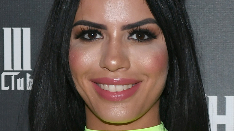 Larissa smiles in 2019