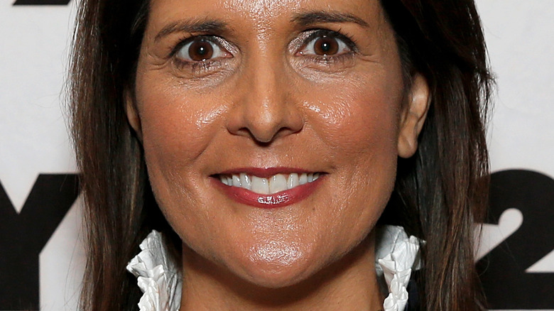 Nikki Haley smiling with brown hair