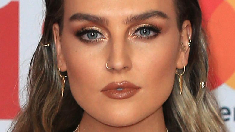 Perrie Edwards gazing in front on the red carpet