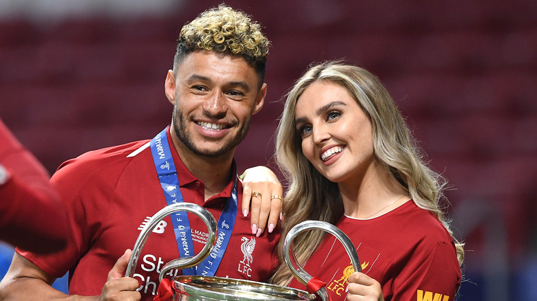 Perrie Edwards and Alex-Oxlade Chamberlain smiling