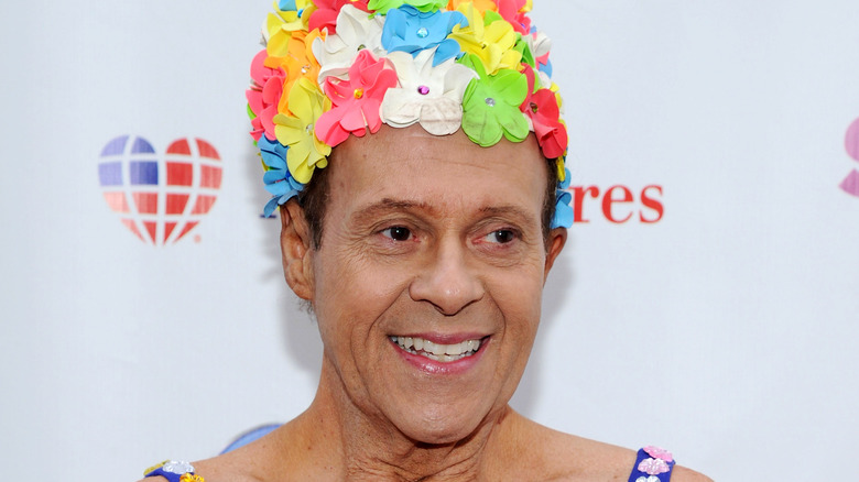 Richard Simmons smiling with teeth