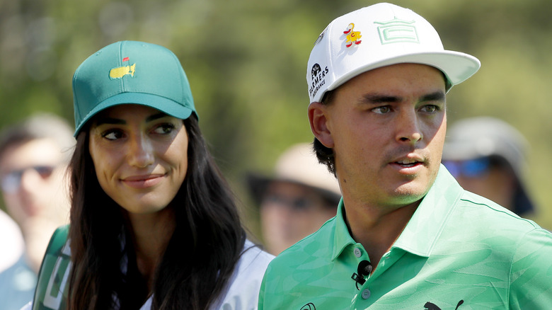 Rickie Fowler and Allison Stokke on golf course