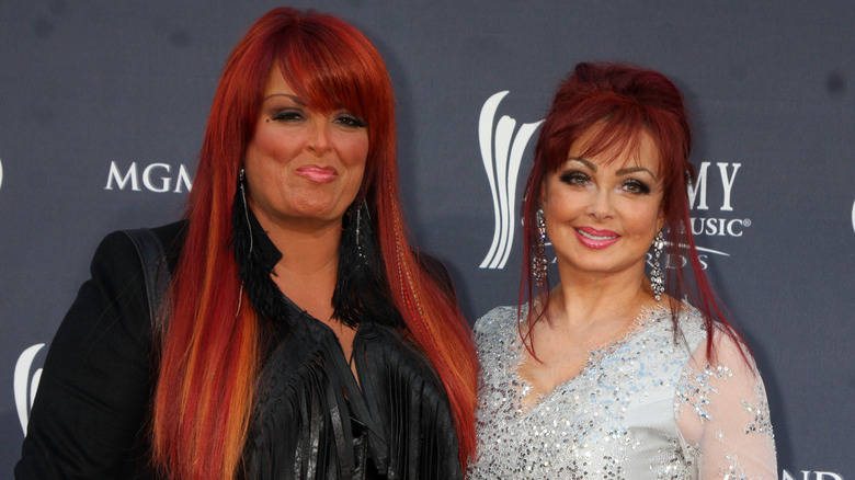 Naomi and Wynonna Judd stand together