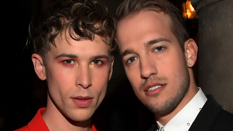 Tommy Dorfman and Peter Zurkuhlen pose on the red carpet