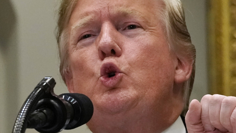 Donald Trump pursing his lips in an anus-like fashion