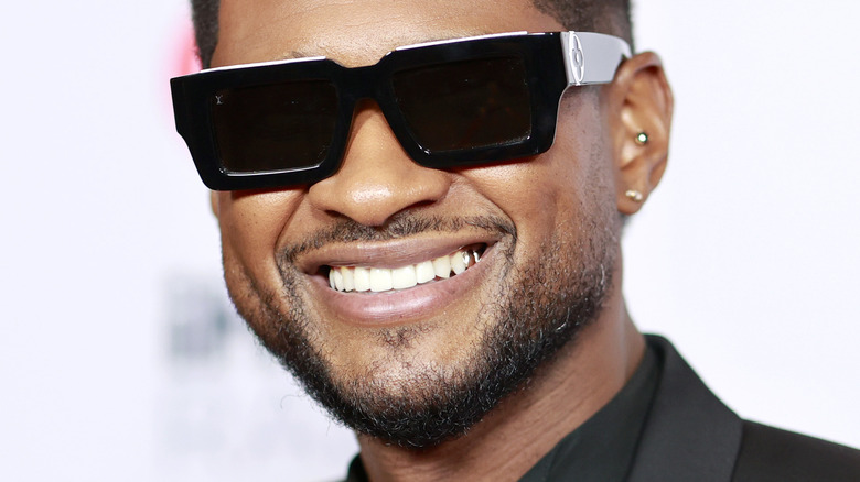 Usher wearing sunglasses