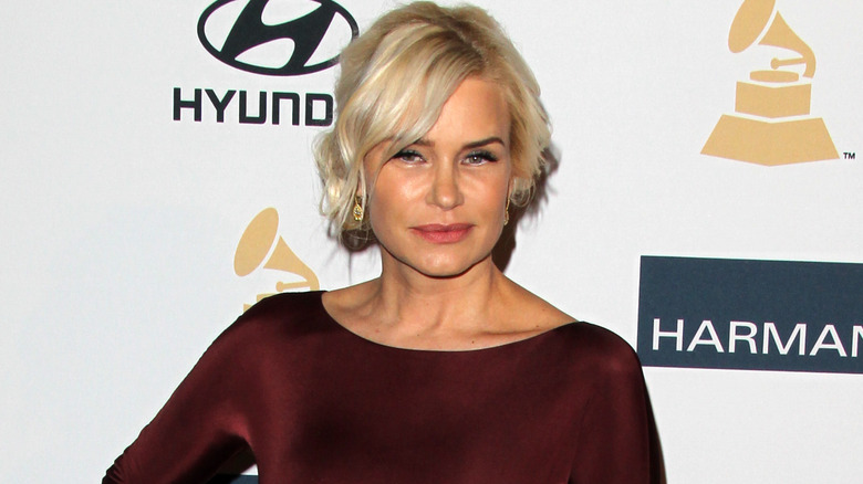 Yolanda Hadid posing in burgundy