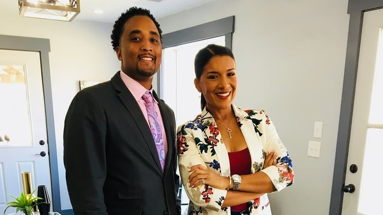 DeRon Jenkins and Page Turner stand together in a home