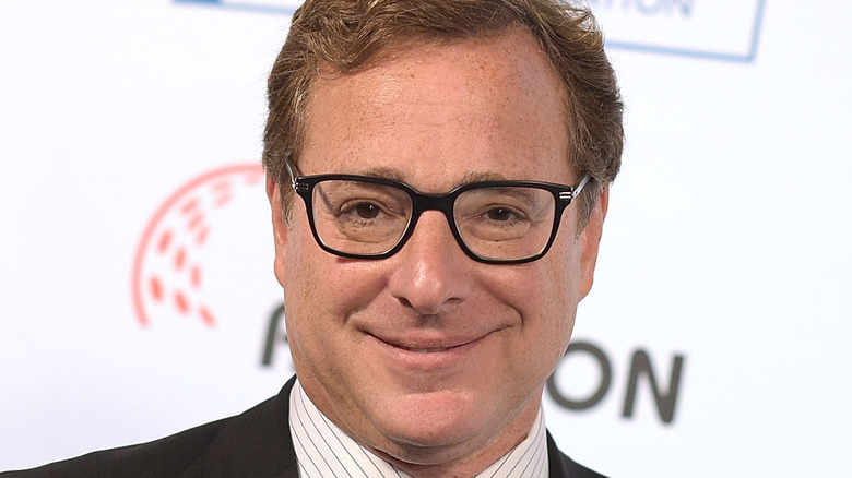 Bob Saget on red carpet, smiling