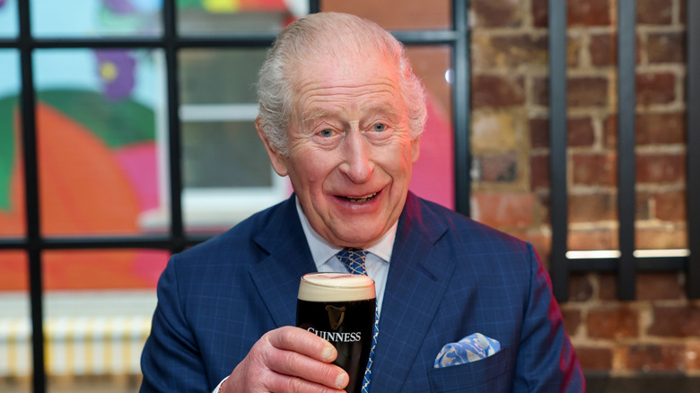 King Charles with a Guinness beer