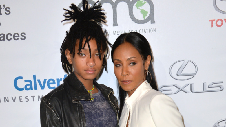 Willow Smith and Jada Pinkett Smith pose side by side.