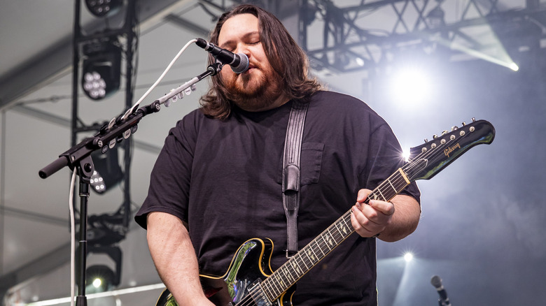 Wolfgang Van Halen performing on a stage