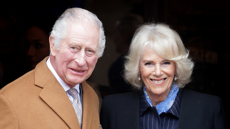 King Charles and Queen Camilla smiling in close-up