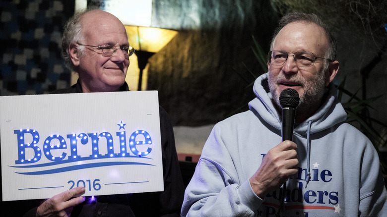 Jerry Greenfield and Ben Cohen with Bernie Sanders merch