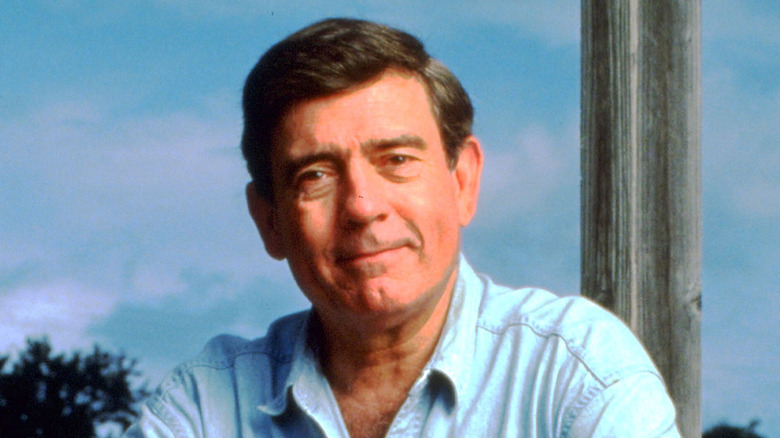 1980s Dan Rather smiles