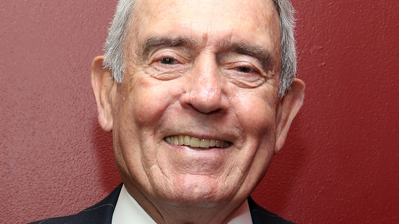 Dan Rather smiles