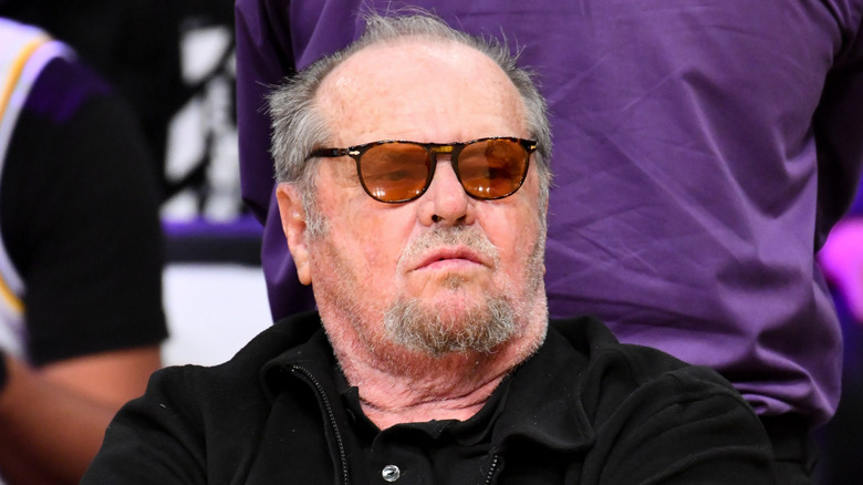 Jack Nicholson watching Los Angeles Lakers and the Golden State Warriors