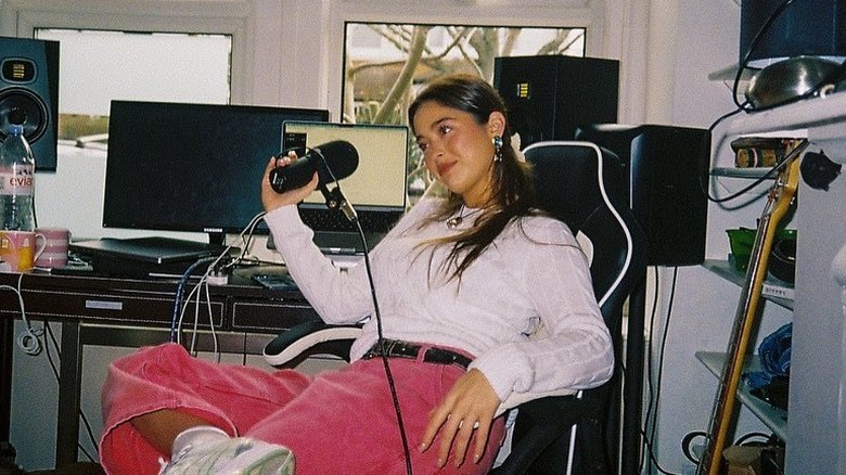 Lola Consuelos posing for cameras in recording studio