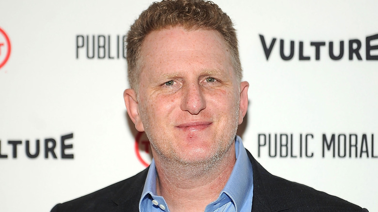Michael Rapaport smiling at camera