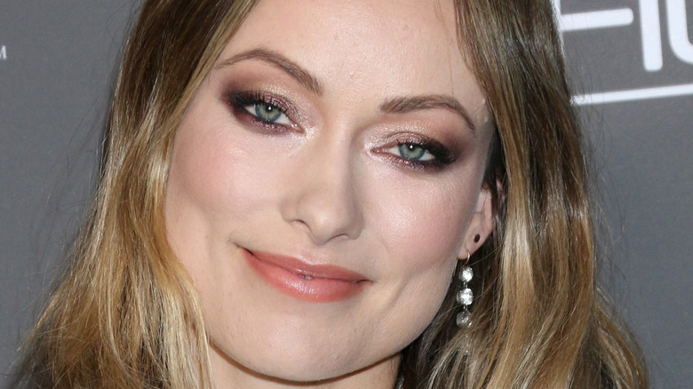 Olivia Wilde smiling gold eyeshadow