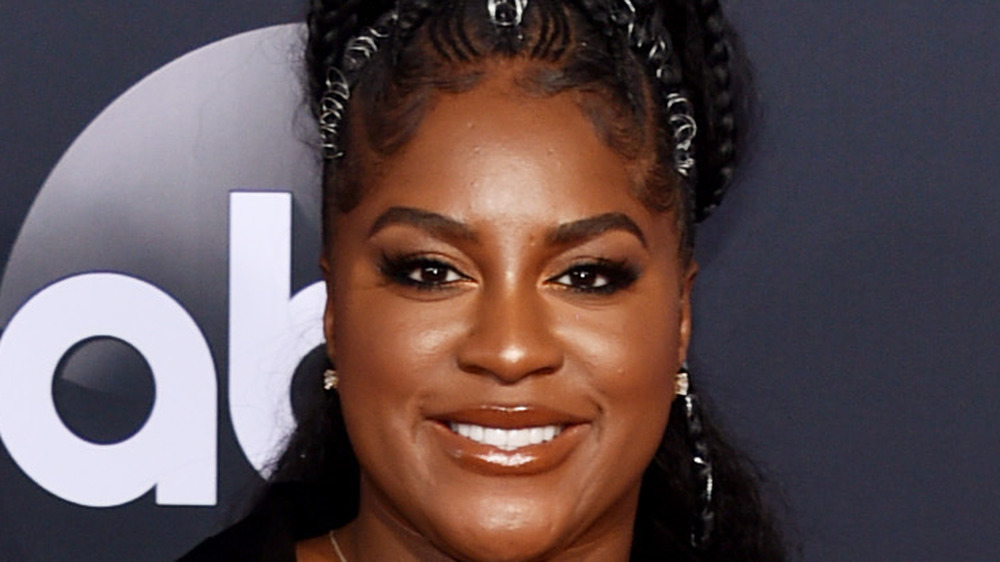 Ester Dean smiling