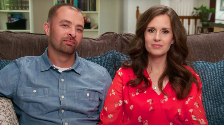 Spencer and Erica Shemwell seated on couch