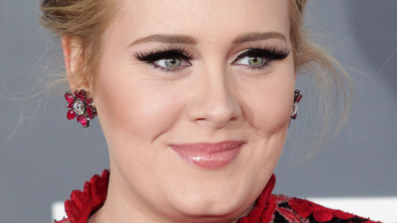 Adele in a red dress