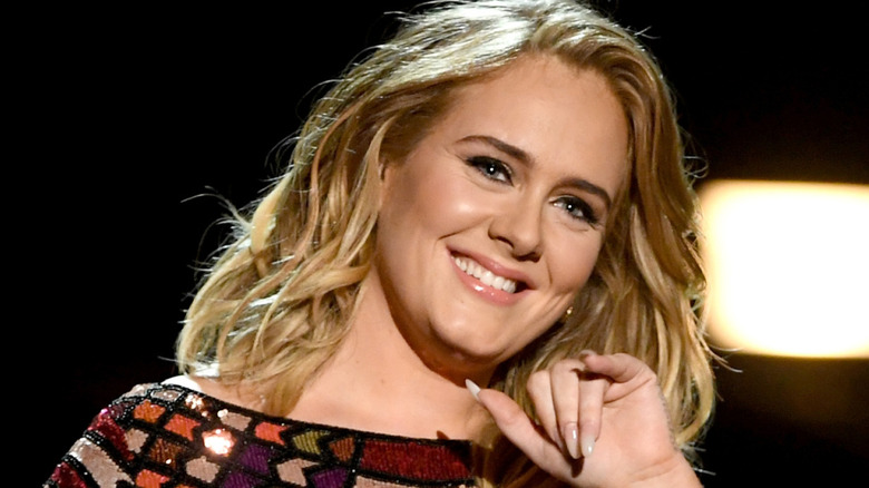 Adele waving on stage