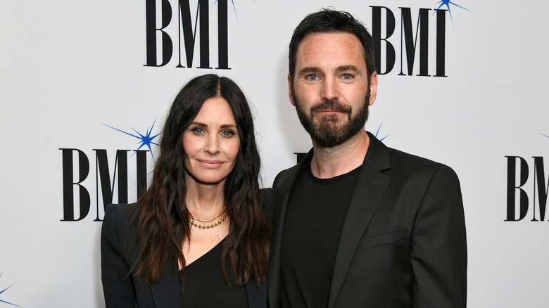 Courteney Cox and Johnny McDaid smiling