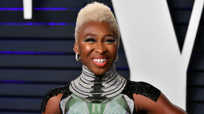Cynthia Erivo in a green dress, smiling