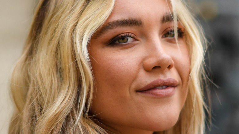 Florence Pugh smiling softly