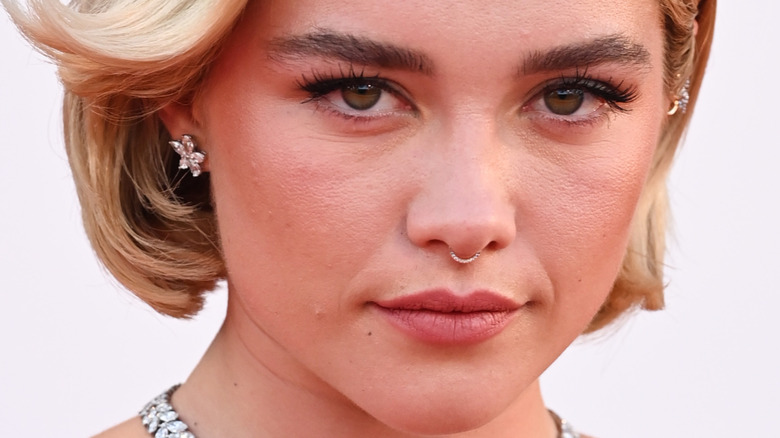 Florence Pugh with short hair, posing