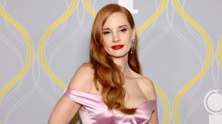 Jessica Chastain, looking serious and posing