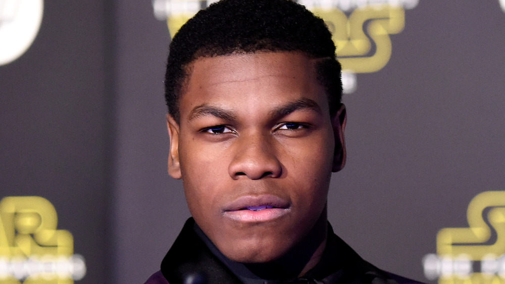 John Boyega with a serious expression