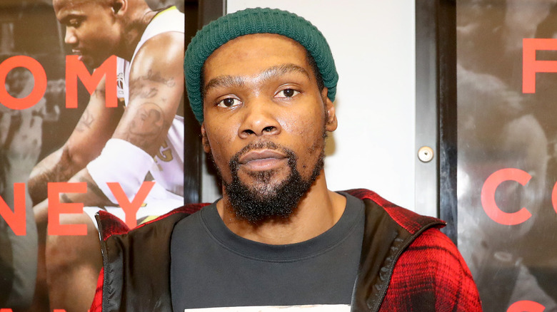 Kevin Durant in a flannel shirt, posing