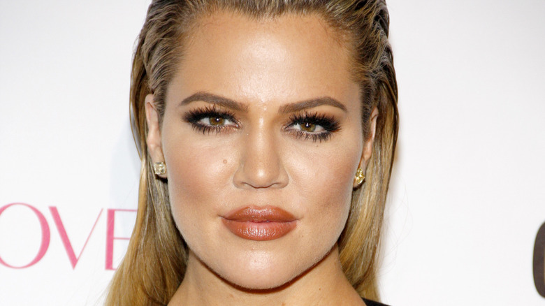 Khloe Kardashian looking at camera