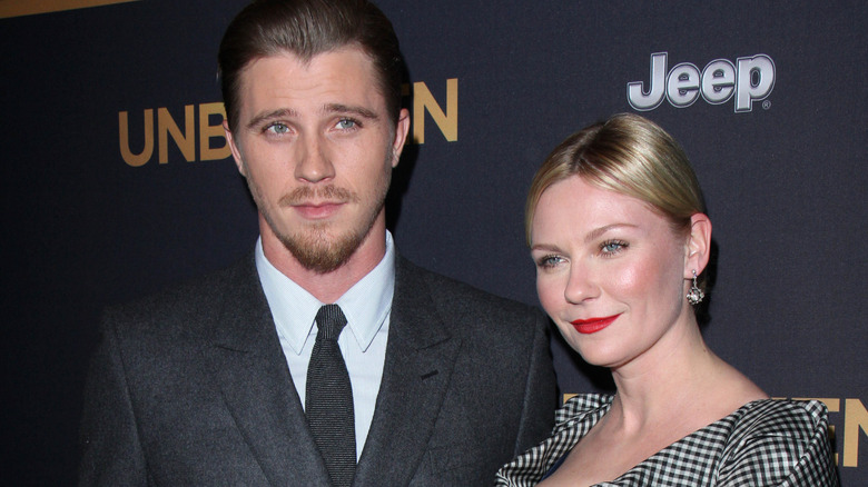 Garrett Hedlund, Kirsten Dunst posing