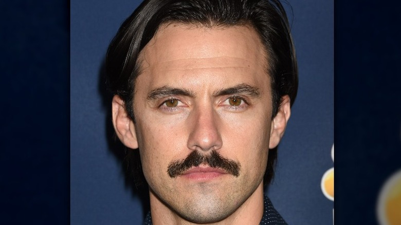Milo Ventimiglia looking serious with mustache