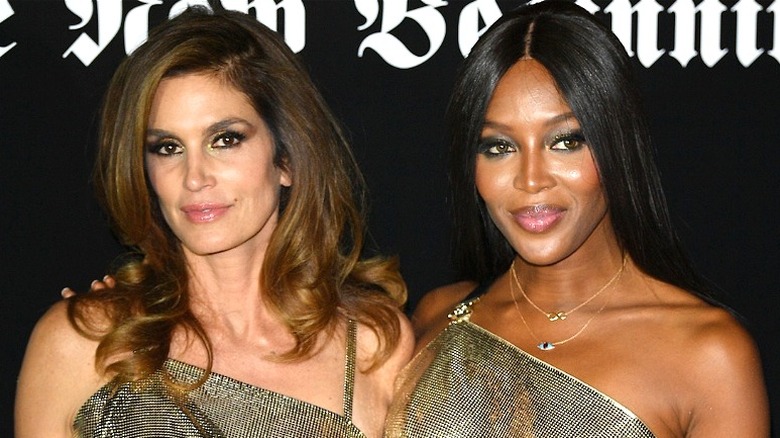 Naomi Campbell posing with Cindy Crawford