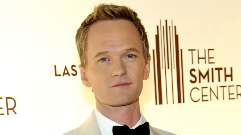 Neil Patrick Harris wearing a white tuxedo jacket