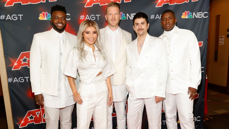 Pentatonix posing and smiling