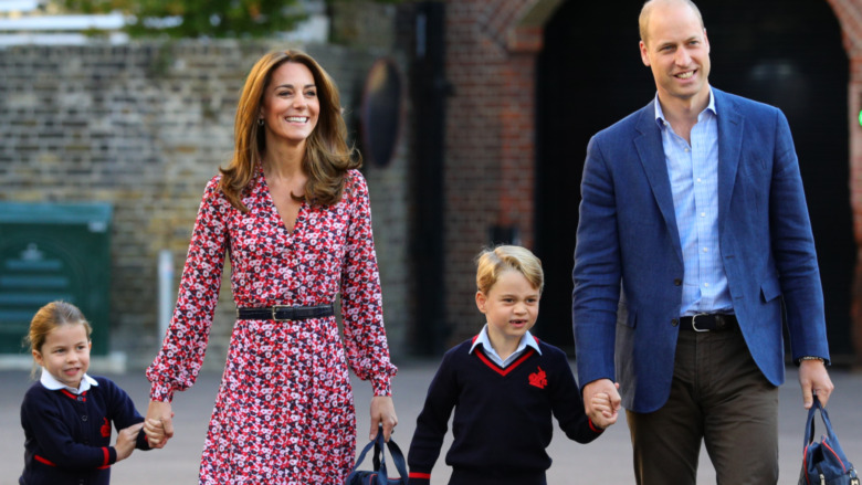 Princess Charlotte, Prince George, Kate Middleton, and Prince William walk