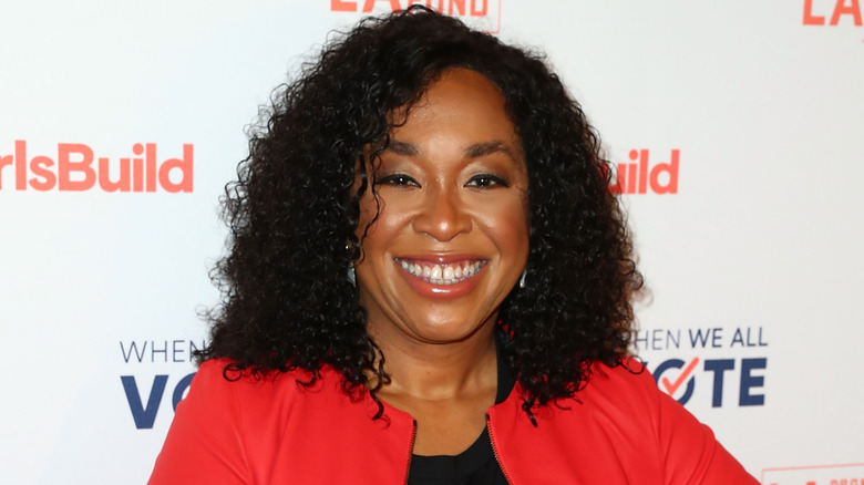 Shonda Rhimes in a red jacket