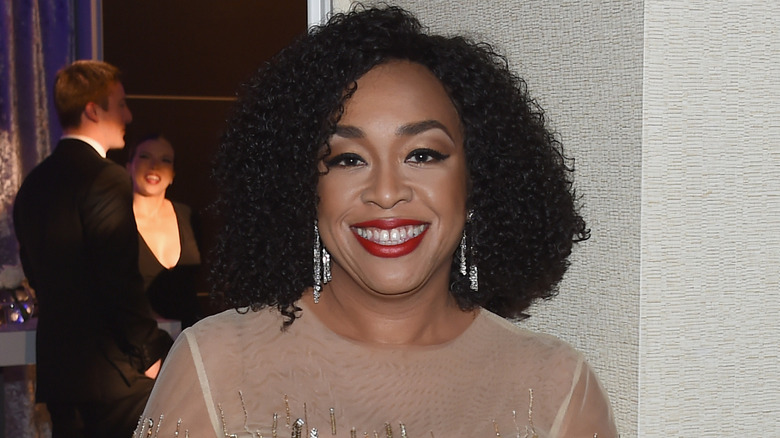 Shonda Rhimes wearing silver earrings