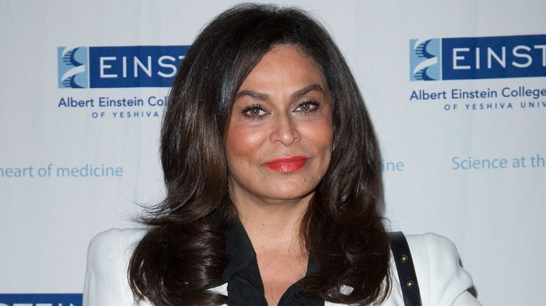 Tina Knowles in white suit